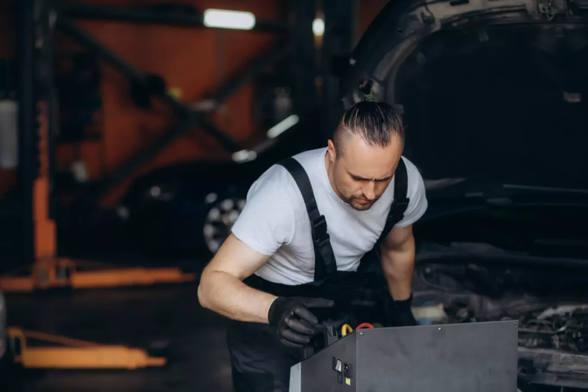 car-mechanic-with-manometer-to-fill-the-gas-in-the-2025-03-14-16-02-58-utc