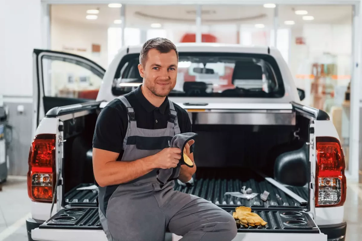 successful-work-man-in-uniform-is-in-the-auto-ser-2025-03-18-20-51-40-utc